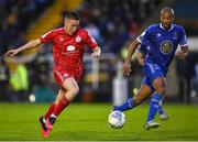 16 October 2022; Jack Moylan of Shelbourne in action against Alex Baptiste of Waterford during the Extra.ie FAI Cup Semi-Final match between Waterford FC and Shelbourne at Waterford RSC in Waterford. Photo by Seb Daly/Sportsfile