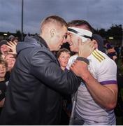 16 October 2022; Injured Kilmacud Crokes' player Paul Mannion celebrates, with team-mate Shane Walsh after the Dublin County Senior Club Championship Football Final match between Kilmacud Crokes and Na Fianna at Parnell Park in Dublin. Photo by Daire Brennan/Sportsfile
