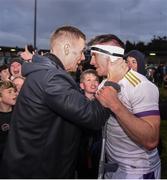 16 October 2022; Injured Kilmacud Crokes' player Paul Mannion celebrates, with team-mate Shane Walsh after the Dublin County Senior Club Championship Football Final match between Kilmacud Crokes and Na Fianna at Parnell Park in Dublin. Photo by Daire Brennan/Sportsfile