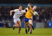 16 October 2022; Eoin O’Dea of Na Fianna in action against Conor Casey, left, and Callum Pearson of Kilmacud Crokes during the Dublin County Senior Club Championship Football Final match between Kilmacud Crokes and Na Fianna at Parnell Park in Dublin. Photo by Daire Brennan/Sportsfile