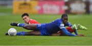 16 October 2022; Tunmise Sobowale of Waterford in action against Matty Smith of Shelbourne during the Extra.ie FAI Cup Semi-Final match between Waterford and Shelbourne at the RSC in Waterford. Photo by Seb Daly/Sportsfile