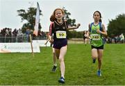 16 October 2022; Lara Woods of Blackrock AC A, Dublin, left, and Anna Ryan of Metro/St Brigids AC A, Dublin, competing in the u11 girls 4x500m event at the Inter-Club Cross Country Relays 2022 during the Autumn International Cross Country Festival 2022 at the Sport Ireland Campus in Dublin. Photo by Sam Barnes/Sportsfile