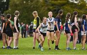 16 October 2022; Athletes from Midleton AC, Cork, centre, compete in the u15 girls 4x1000m event at the Inter-Club Cross Country Relays 2022 during the Autumn International Cross Country Festival 2022 at the Sport Ireland Campus in Dublin. Photo by Sam Barnes/Sportsfile
