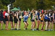 16 October 2022; Athletes from Waterford AC, centre, pass the baton whilst competing in the u15 girls 4x1000m event at the Inter-Club Cross Country Relays 2022 during the Autumn International Cross Country Festival 2022 at the Sport Ireland Campus in Dublin. Photo by Sam Barnes/Sportsfile