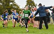 16 October 2022; An athlete from Raheny Shamrock AC, Dublin, competing in the u13 girls 4x500m event at the Inter-Club Cross Country Relays 2022 during the Autumn International Cross Country Festival 2022 at the Sport Ireland Campus in Dublin. Photo by Sam Barnes/Sportsfile