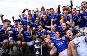 15 October 2022; Naomh Conaill players celebrate after their side's victory in the Donegal County Senior Club Football Championship Final between Naomh Conaill and St Eunan's at Páirc Sheáin Mhic Cumhaill in Ballybofey, Donegal. Photo by Piaras Ó Mídheach/Sportsfile