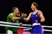 21 October 2022; Aoife O'Rourke of Ireland celebrates with coach Zaur Antia after victory over Love Holgersson of Sweden in their middleweight 75kg semi-final bout during the EUBC Women's European Boxing Championships 2022 at Budva Sports Centre in Budva, Montenegro. Photo by Ben McShane/Sportsfile