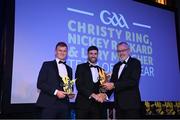 21 October 2022; Kildare hurler Rian Boran, left, and Derry hurler Mark Craig, second from left, are presented with their Ring, Rackard, and Meagher Team of the Year for 2022 awards by Uachtarán Chumann Lúthchleas Gael Larry McCarthy during the GAA Champion 15 Awards at Croke Park in Dublin. Photo by Harry Murphy/Sportsfile