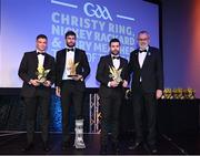 21 October 2022; Roscommon hurler Padraig Kelly, left, Kildare hurler Paul Divilly, second from left, and Tyrone hurler Chris Kearns, third from left, are presented with their Ring, Rackard, and Meagher Team of the Year for 2022 awards by Uachtarán Chumann Lúthchleas Gael Larry McCarthy during the GAA Champion 15 Awards at Croke Park in Dublin. Photo by Harry Murphy/Sportsfile