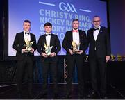 21 October 2022;  Kildare hurler Brian Byrne, left, Sligo hurler Andy Kilcullen, are presented with their Ring, Rackard, and Meagher Team of the Year for 2022 awards by Uachtarán Chumann Lúthchleas Gael Larry McCarthy. Aodhan McHugh, third from left, collected an award on behalf of the late Tyrone hurler Damian Casey,  during the GAA Champion 15 Awards at Croke Park in Dublin. Photo by Harry Murphy/Sportsfile