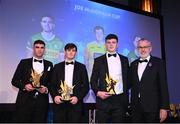 21 October 2022; Players, from left, Kerry hurler Eoin Ross, Antrim hurler Gerard Walsh and Antrim hurler Joe Maskey, are presented with their Joe McDonagh Team of the Year for 2022 award by Uachtarán Chumann Lúthchleas Gael Larry McCarthy, right,  during the GAA Champion 15 Awards at Croke Park in Dublin. Photo by Harry Murphy/Sportsfile