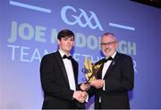 21 October 2022; Antrim hurler Gerard Walsh, left, is presented with his Joe McDonagh Team of the Year for 2022 award by Uachtarán Chumann Lúthchleas Gael Larry McCarthy during the GAA Champion 15 Awards at Croke Park in Dublin. Photo by Harry Murphy/Sportsfile