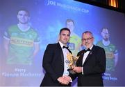 21 October 2022; Kerry hurler Fionan Mackessy, left, is presented with his Joe McDonagh Team of the Year for 2022 award by Uachtarán Chumann Lúthchleas Gael Larry McCarthy during the GAA Champion 15 Awards at Croke Park in Dublin. Photo by Harry Murphy/Sportsfile