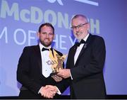 21 October 2022; Kerry hurler Mikey Boyle, left, is presented with his Joe McDonagh Team of the Year for 2022 award by Uachtarán Chumann Lúthchleas Gael Larry McCarthy during the GAA Champion 15 Awards at Croke Park in Dublin. Photo by Harry Murphy/Sportsfile