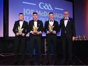 21 October 2022; Players, from left, Down hurler Daithí Sands, Carlow hurler Chris Nolan and Carlow hurler Martin Kavanagh are presented with their Joe McDonagh Team of the Year for 2022 awards by Uachtarán Chumann Lúthchleas Gael Larry McCarthy, right, during the GAA Champion 15 Awards at Croke Park in Dublin. Photo by Harry Murphy/Sportsfile