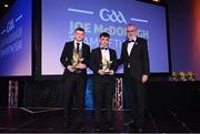 21 October 2022; Players Antrim hurler Keelan Molloy, left, and Offaly hurler David Nally, centre, are presented with their Joe McDonagh Team of the Year for 2022 awards by Uachtarán Chumann Lúthchleas Gael Larry McCarthy, right, during the GAA Champion 15 Awards at Croke Park in Dublin. Photo by Harry Murphy/Sportsfile
