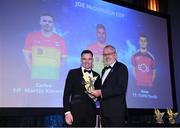21 October 2022; Carlow hurler Martin Kavanagh, left, is presented with his Joe McDonagh Team of the Year for 2022 award by Uachtarán Chumann Lúthchleas Gael Larry McCarthy during the GAA Champion 15 Awards at Croke Park in Dublin. Photo by Harry Murphy/Sportsfile