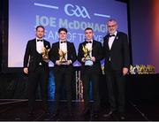 21 October 2022; Players, from left, Kerry hurler Pádraig Boyle, Antrim hurler Conal Cunning and Antrim hurler Ciarán Clarke are presented with their Joe McDonagh Team of the Year for 2022 awards by Uachtarán Chumann Lúthchleas Gael Larry McCarthy, right, during the GAA Champion 15 Awards at Croke Park in Dublin. Photo by Harry Murphy/Sportsfile