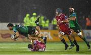 21 October 2022; Conor Oliver of Connacht is tackled by Kieran Hardy of Scarlets during the United Rugby Championship match between Connacht and Scarlets at The Sportsground in Galway. Photo by David Fitzgerald/Sportsfile