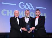 21 October 2022;  Sean Casey, left, father of the late Tyrone hurler Damian Casey, and Aodhan McHugh, right, collect the Nickey Rackard Player of the Year for 2022 award from Uachtarán Chumann Lúthchleas Gael Larry McCarthy, on behalf of the late Tyrone Hurler Damian Casey, during the GAA Champion 15 Awards at Croke Park in Dublin. Photo by Harry Murphy/Sportsfile