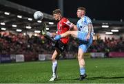 21 October 2022; Kameron Ledwidge of Shelbourne is tackled by Ronan Boyce of Derry City during the SSE Airtricity League Premier Division match between Derry City and Shelbourne at The Ryan McBride Brandywell Stadium in Derry. Photo by Ramsey Cardy/Sportsfile