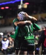 21 October 2022; Mack Hansen of Connacht is congratulated by team mate Tiernan O'Halloran after scoring their side's second try during the United Rugby Championship match between Connacht and Scarlets at The Sportsground in Galway. Photo by David Fitzgerald/Sportsfile