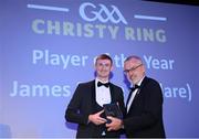 21 October 2022; Kildare hurler James Burke receives the Christy Ring player of the year award from Uachtarán Chumann Lúthchleas Gael Larry McCarthy during the GAA Champion 15 Awards at Croke Park in Dublin. Photo by Harry Murphy/Sportsfile