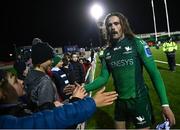 21 October 2022; Mack Hansen of Connacht with supporters after the United Rugby Championship match between Connacht and Scarlets at The Sportsground in Galway. Photo by David Fitzgerald/Sportsfile