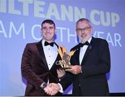 21 October 2022; Leitrim footballer Keith Beirne receives his 2022 Tailteann Cup team of the Year award from Uachtarán Chumann Lúthchleas Gael Larry McCarthy during the GAA Champion 15 Awards at Croke Park in Dublin. Photo by Harry Murphy/Sportsfile