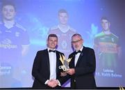 21 October 2022; Westmeath footballer John Heslin receives his 2022 Tailteann Cup team of the Year award from Uachtarán Chumann Lúthchleas Gael Larry McCarthy during the GAA Champion 15 Awards at Croke Park in Dublin. Photo by Harry Murphy/Sportsfile