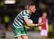 21 October 2022; Andy Lyons of Shamrock Rovers removes an object from the pitch during the SSE Airtricity League Premier Division match between Shamrock Rovers and St Patrick's Athletic at Tallaght Stadium in Dublin. Photo by Seb Daly/Sportsfile