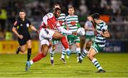 21 October 2022; Tunde Owolabi of St Patrick's Athletic in action against Roberto Lopes of Shamrock Rovers during the SSE Airtricity League Premier Division match between Shamrock Rovers and St Patrick's Athletic at Tallaght Stadium in Dublin. Photo by Seb Daly/Sportsfile