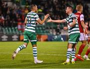 21 October 2022; Graham Burke of Shamrock Rovers, left, celebrates with teammate Ronan Finn of Shamrock Rovers after scoring their side's first goal during the SSE Airtricity League Premier Division match between Shamrock Rovers and St Patrick's Athletic at Tallaght Stadium in Dublin. Photo by Seb Daly/Sportsfile
