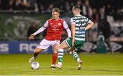 21 October 2022; Sam Curtis of St Patrick's Athletic in action against Andy Lyons of Shamrock Rovers during the SSE Airtricity League Premier Division match between Shamrock Rovers and St Patrick's Athletic at Tallaght Stadium in Dublin. Photo by Seb Daly/Sportsfile