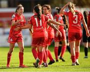 22 October 2022; Abbie Larkin of Shelbourne, left, celebrates with teammates Megan Smyth-Lynch, centre, and Pearl Slattery, not seen, after scoring her side's second goal during the SSE Airtricity Women's National League match between Shelbourne and Sligo Rovers at Tolka Park in Dublin. Photo by Tyler Miller/Sportsfile
