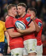 22 October 2022; Liam Coombes of Munster, right, celebrates with Gavin Coombes after scoring their side's first try during the United Rugby Championship match between Leinster and Munster at Aviva Stadium in Dublin. Photo by Ramsey Cardy/Sportsfile