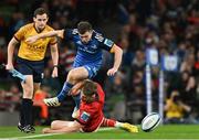 22 October 2022; Luke McGrath of Leinster is tackled by Liam Coombes of Munster during the United Rugby Championship match between Leinster and Munster at Aviva Stadium in Dublin. Photo by Harry Murphy/Sportsfile