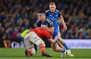 22 October 2022; Dan Sheehan of Leinster is tackled by John Hodnett of Munster during the United Rugby Championship match between Leinster and Munster at Aviva Stadium in Dublin. Photo by Brendan Moran/Sportsfile