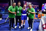 22 October 2022; Amy Broadhurst of Ireland, celebrates with coaches from left, John Conlan, Eoin Cluck and Zaur Antia after her victory against Mariia Bova of Ukraine in their light welterweight 63kg final during the EUBC Women's European Boxing Championships 2022 at Budva Sports Centre in Budva, Montenegro. Photo by Ben McShane/Sportsfile