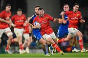 22 October 2022; Diarmuid Barron of Munster makes a break during the United Rugby Championship match between Leinster and Munster at Aviva Stadium in Dublin. Photo by Ramsey Cardy/Sportsfile