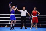 22 October 2022; Amy Broadhurst of Ireland, left, celebrates after her victory against Mariia Bova of Ukraine in their light welterweight 63kg final during the EUBC Women's European Boxing Championships 2022 at Budva Sports Centre in Budva, Montenegro. Photo by Ben McShane/Sportsfile