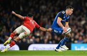 22 October 2022; Jonathan Sexton of Leinster evades the tackle of Conor Murray of Munster during the United Rugby Championship match between Leinster and Munster at Aviva Stadium in Dublin. Photo by Harry Murphy/Sportsfile