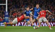 22 October 2022; Rob Russell of Leinster is tackled by Dan Goggin of Munster during the United Rugby Championship match between Leinster and Munster at Aviva Stadium in Dublin. Photo by Brendan Moran/Sportsfile