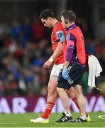 22 October 2022; Joey Carbery of Munster leaves the pitch with an injury during the United Rugby Championship match between Leinster and Munster at Aviva Stadium in Dublin. Photo by Ramsey Cardy/Sportsfile