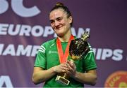 22 October 2022; Kellie Harrington of Ireland, looks emotional as she holds her gold medal and trophy after winning the lightweight 60kg final during the EUBC Women's European Boxing Championships 2022 at Budva Sports Centre in Budva, Montenegro. Photo by Ben McShane/Sportsfile