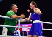 22 October 2022; Aoife O'Rourke of Ireland, celebrates with coach Zaur Antia after her victory against Elzbieta Wojcik of Poland in their middleweight 75kg final during the EUBC Women's European Boxing Championships 2022 at Budva Sports Centre in Budva, Montenegro. Photo by Ben McShane/Sportsfile