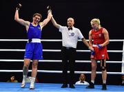 22 October 2022; Aoife O'Rourke of Ireland, left, is declared victorious after defeating Elzbieta Wojcik of Poland in their middleweight 75kg final during the EUBC Women's European Boxing Championships 2022 at Budva Sports Centre in Budva, Montenegro. Photo by Ben McShane/Sportsfile