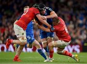 22 October 2022; James Ryan of Leinster is tackled by Ruadhan Quinn, left, and Gavin Coombes of Munster during the United Rugby Championship match between Leinster and Munster at Aviva Stadium in Dublin. Photo by Brendan Moran/Sportsfile