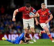 22 October 2022; Jack O'Donoghue of Munster is tackled by Nick McCarthy of Leinster during the United Rugby Championship match between Leinster and Munster at Aviva Stadium in Dublin. Photo by Ramsey Cardy/Sportsfile