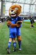 22 October 2022; Mascot Cormac de Búrca with Leo the Lion at the United Rugby Championship match between Leinster and Munster at Aviva Stadium in Dublin. Photo by Harry Murphy/Sportsfile